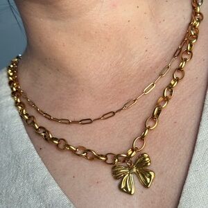 Gold Layered Necklace with Bow Pendant
